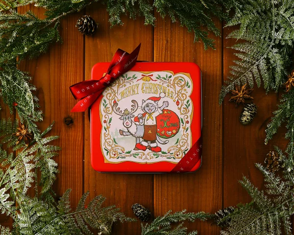 三陽物産、マスコットキャラクター「クレメ」をデザインモチーフにしたクリスマス限定のクッキー缶を販売